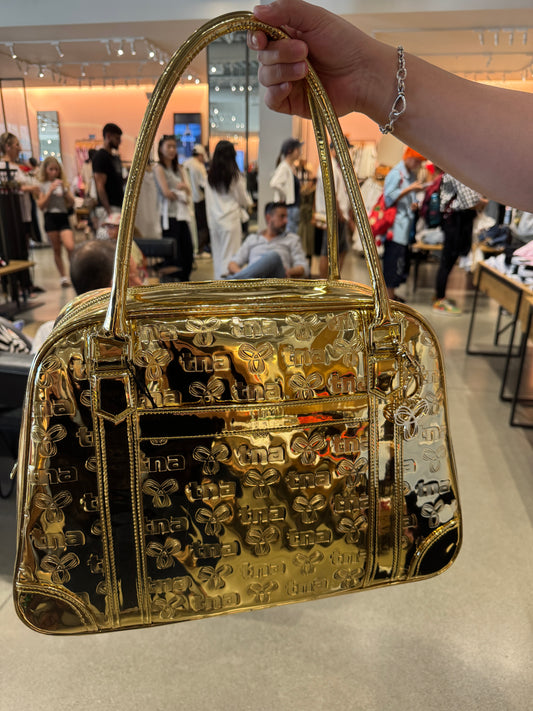 Aritzia Throwback Bag , Limited-edition metallic bowling duffle bag