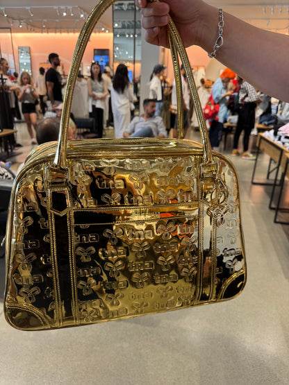 Aritzia Throwback Bag , Limited-edition metallic bowling duffle bag